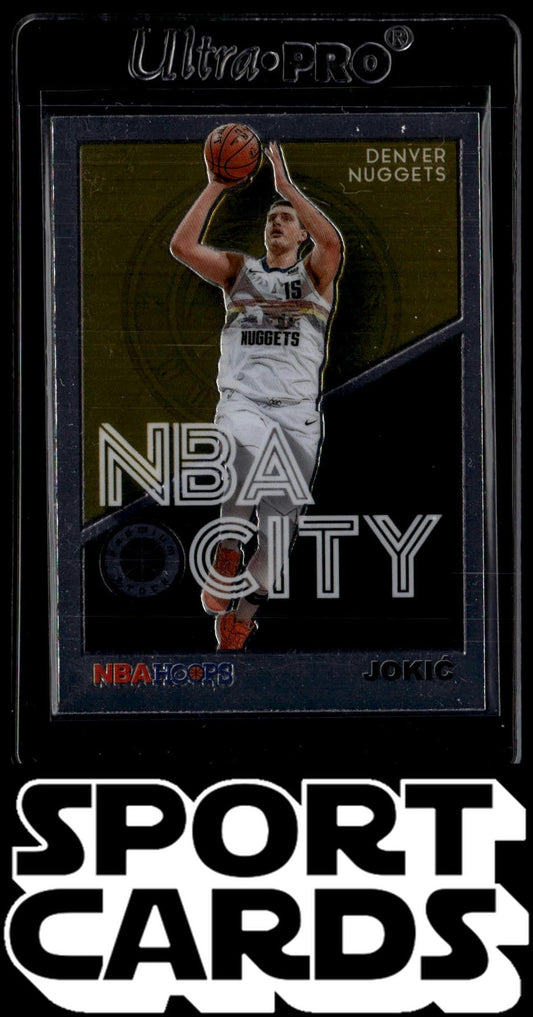 2019-20 Hoops Premium Stock #18 Nikola Jokic NBA City Blue SportCards.com