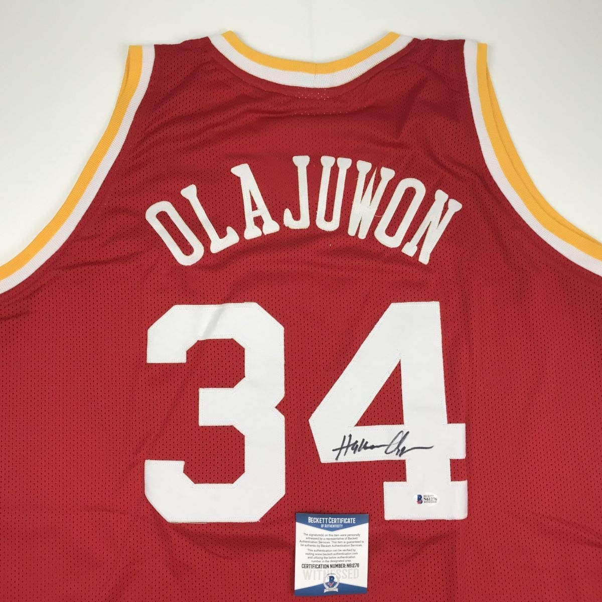 Autographed/Signed Hakeem Olajuwon Houston Red Basketball Jersey Beckett BAS COA - Sport Cards