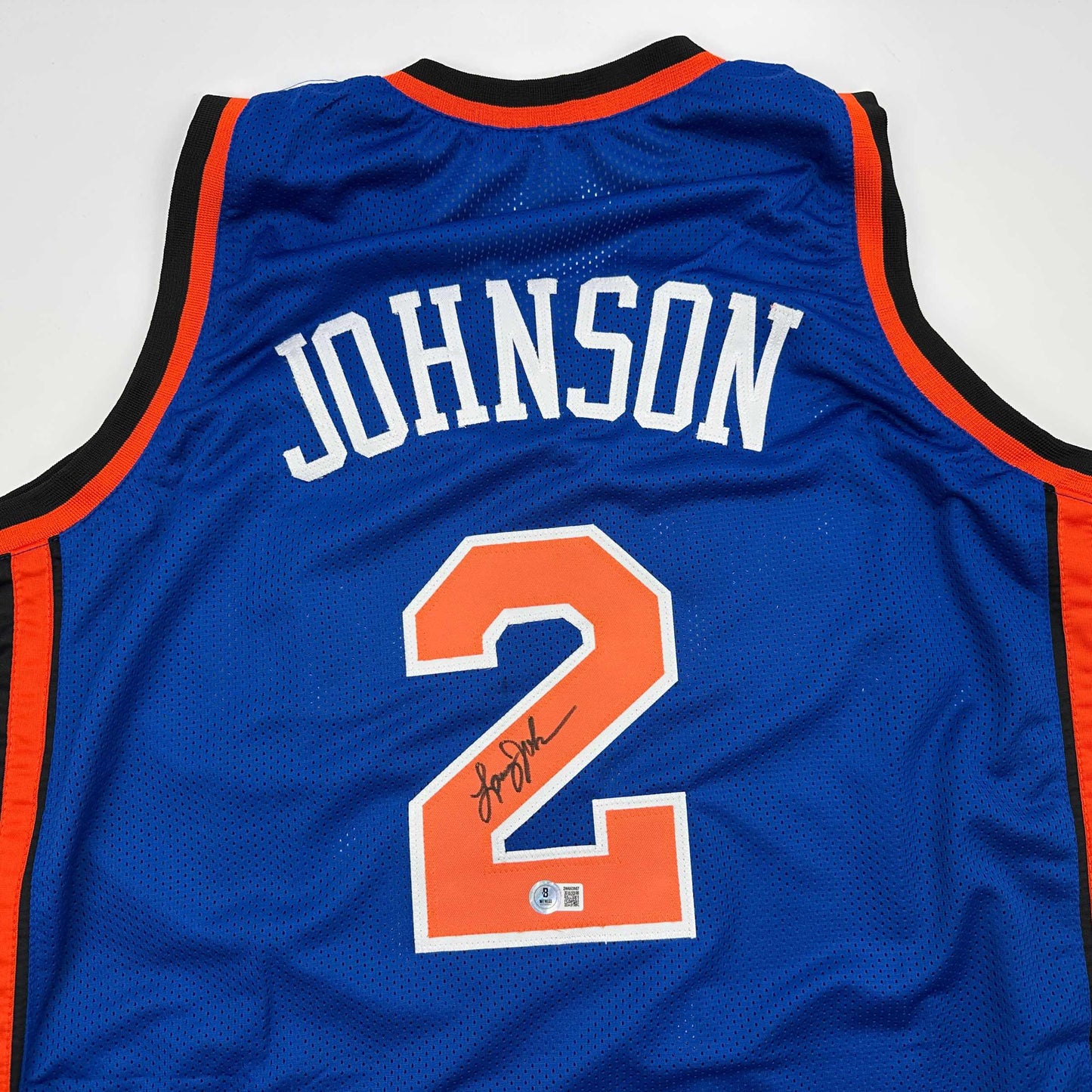 Autographed/Signed Larry Johnson New York Blue Basketball Jersey Beckett BAS COA - Sport Cards