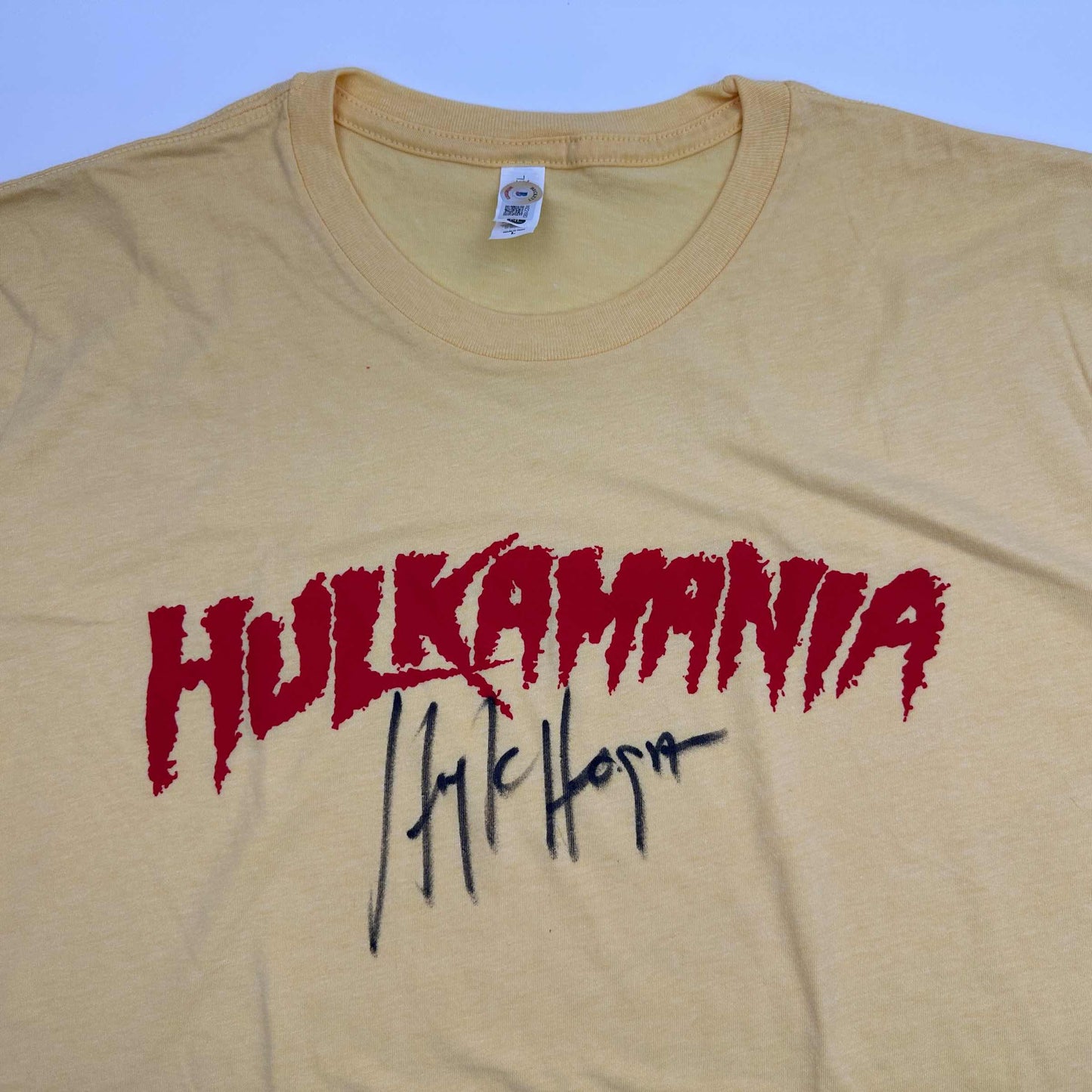 Autographed/Signed Hulk Hogan Hulkamania Yellow WWE Wrestling Shirt T-Shirt Beckett BAS COA