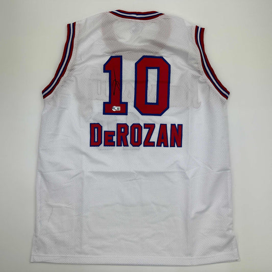 Autographed/Signed DeMar DeRozan Sacramento White Kansas City Retro Basketball Jersey Beckett BAS COA - Sport Cards
